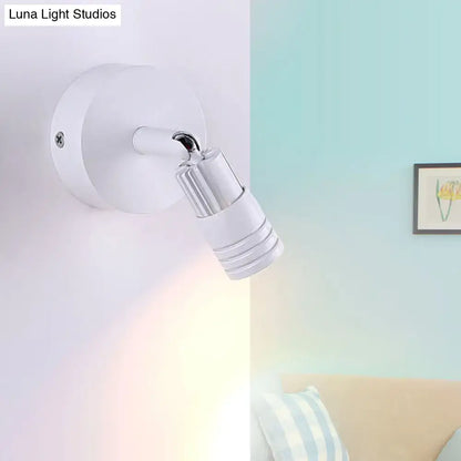 White metal wall spotlight with adjustable cylindrical head on round wall mount Decorbites on Tampa Home & Garden Store