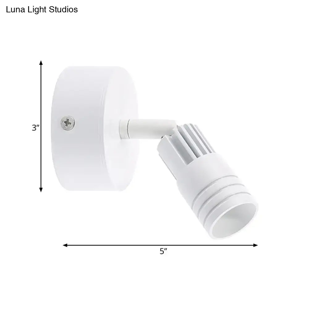White metal wall spotlight by Decorbites with adjustable head and round mount 5 in span on Tampa Home & Garden Store