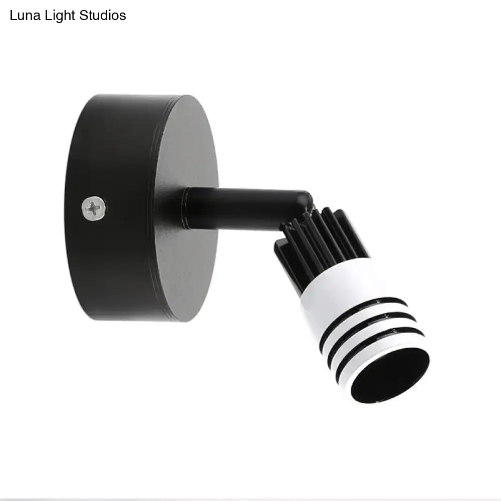 White metal wall spotlight by Decorbites with black wall mount and adjustable white head on Tampa Home & Garden Store