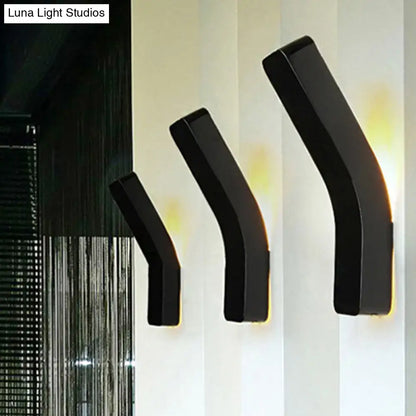 White Corridor Wall Light set of 3 black curved sconces with warm glow on white wall on Tampa Home & Garden Store