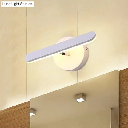 White modern vanity light bar by Decorbites, wall-mounted LED fixture above mirror on Tampa Home & Garden Store