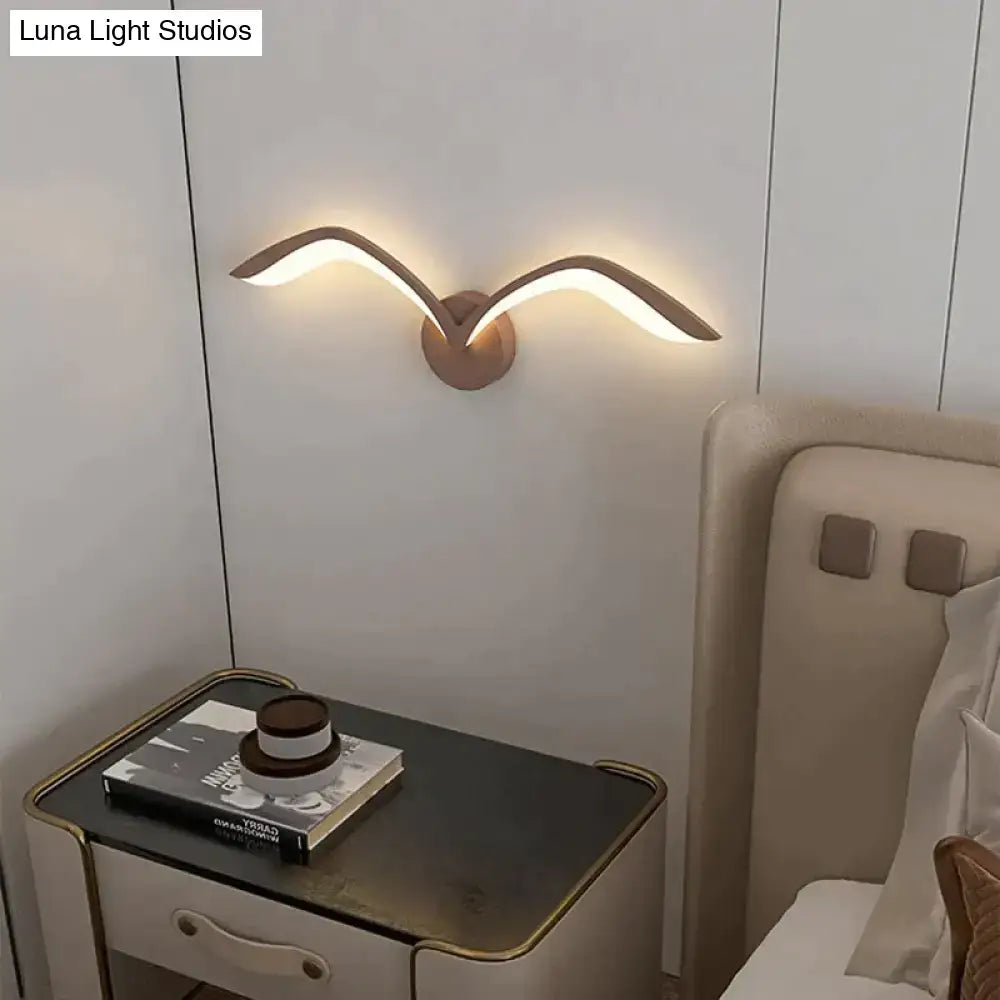 White Nordic Wing Sconce wall light by Decorbites with wood-tone arms, warm glow on Tampa Home & Garden Store
