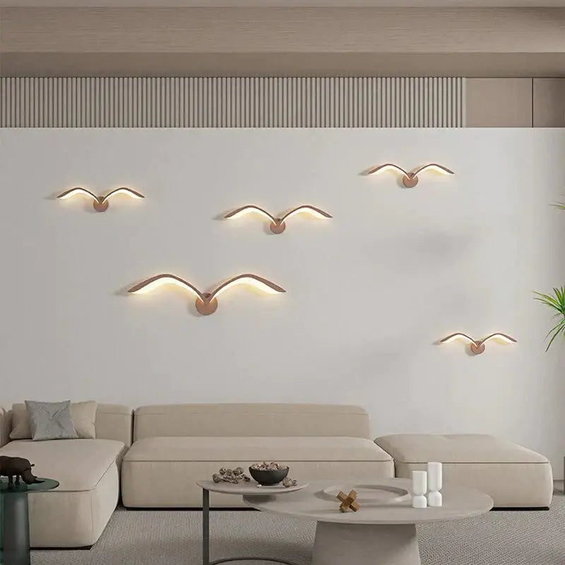 Decorbites White Nordic Wing Sconce six wing wall lights with warm glow on white wall on Tampa Home & Garden Store