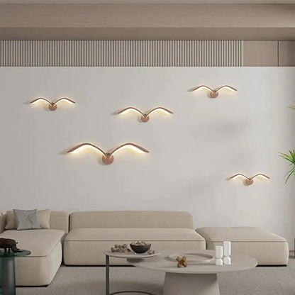 Decorbites White Nordic Wing Sconce six wing wall lights with warm glow on white wall on Tampa Home & Garden Store