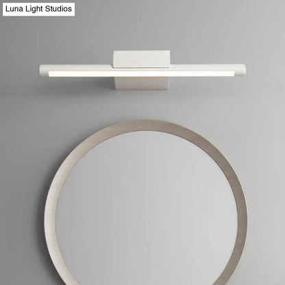 White LED pole vanity wall light by Decorbites, sleek fixture above a round mirror on Tampa Home & Garden Store