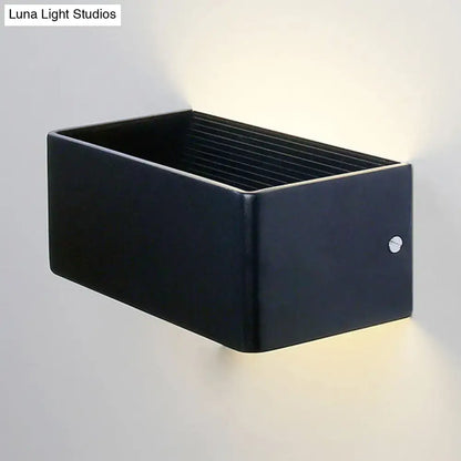 Gold Rectangular Wall Lamp black metal wall sconce, emits warm downward glow on Tampa Home & Garden Store