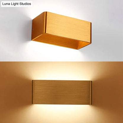 Gold rectangular wall lamp sconce in brushed metal finish, top and bottom glow on Tampa Home & Garden Store