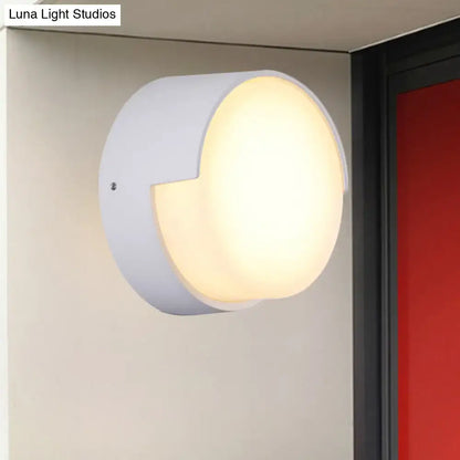 Decorbites white metal acrylic wall light sconce with circular frosted diffuser and notch on Tampa Home & Garden Store