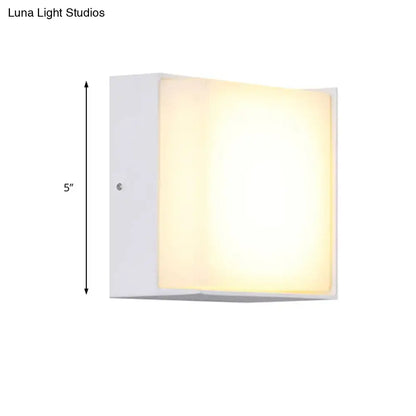 White rectangular metal acrylic wall light by Decorbites, 5-inch tall with warm glow on Tampa Home & Garden Store