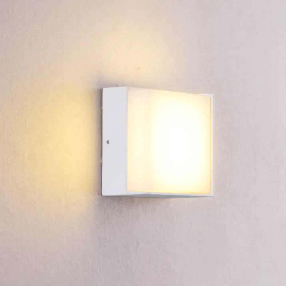 White rectangular metal acrylic wall light by Decorbites, wall-mounted sconce with warm glow on Tampa Home & Garden Store