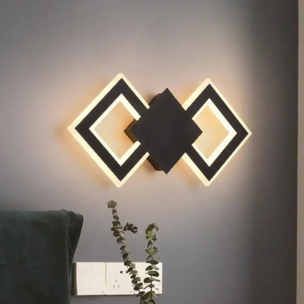 White metal LED wall sconce with geometric interlocking diamonds by Decorbites on Tampa Home & Garden Store