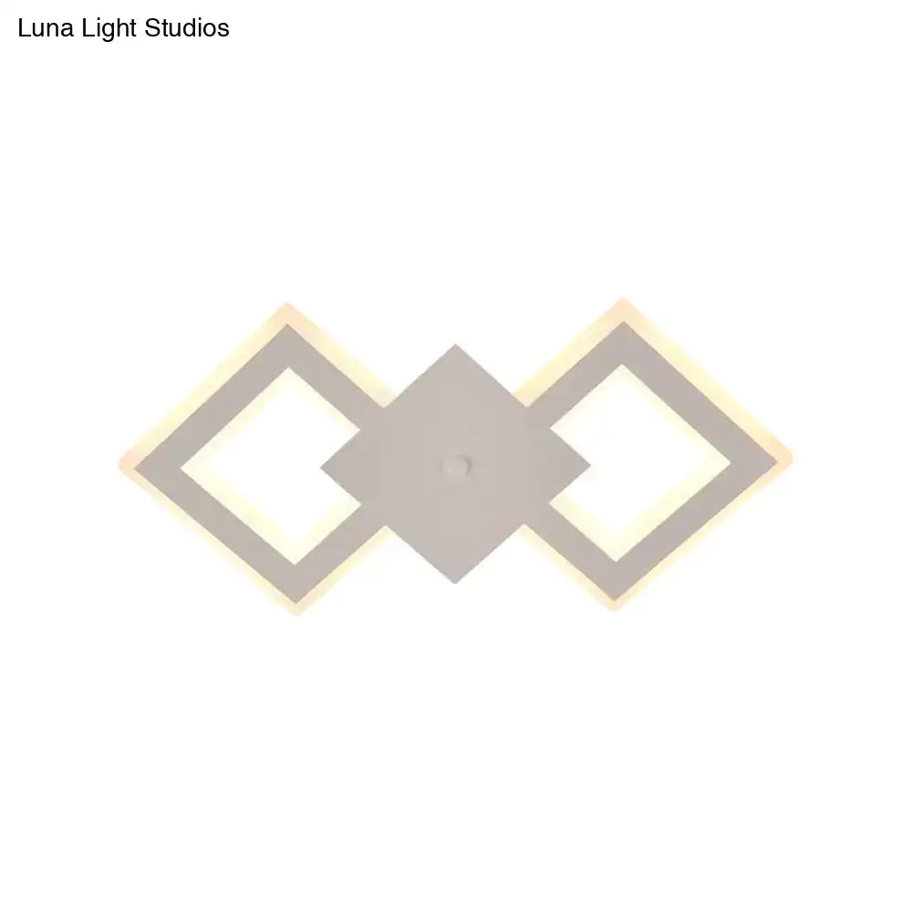 White metal LED wall sconce with geometric diamond frames by Decorbites on Tampa Home & Garden Store