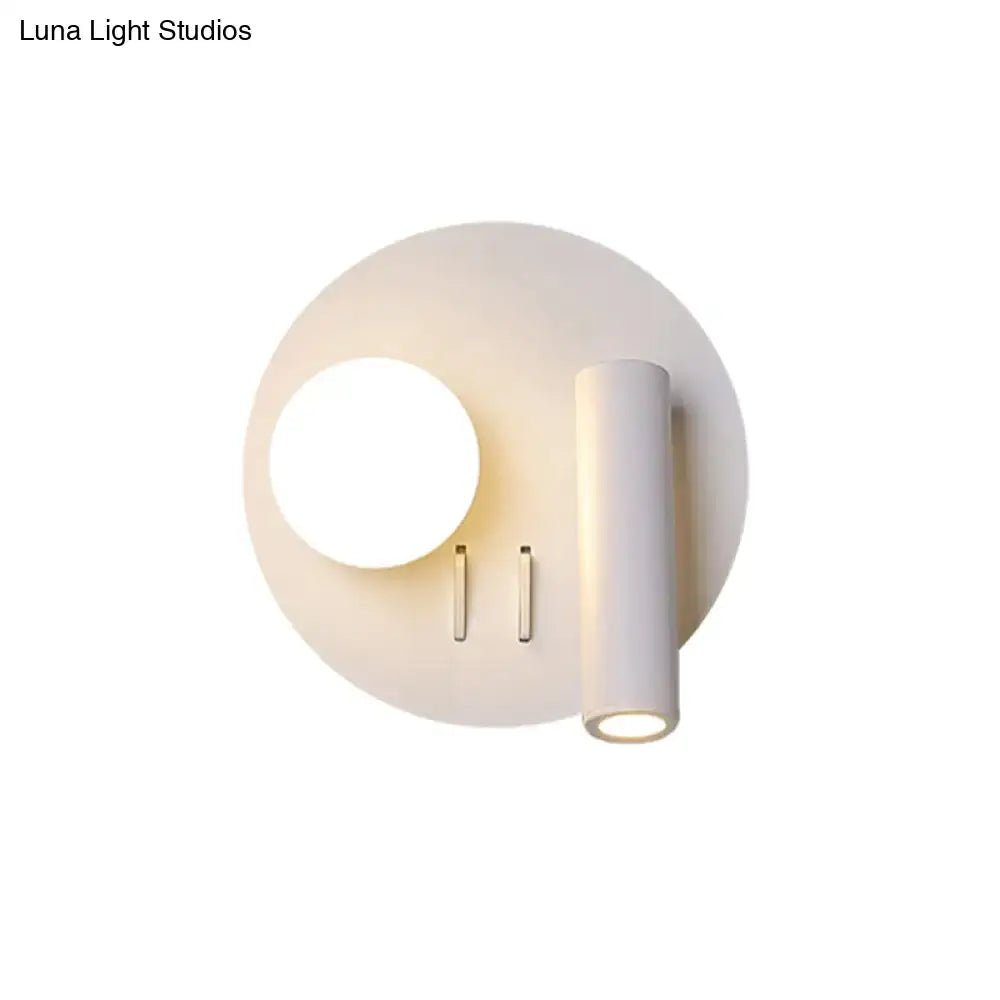 White round wall sconce with cylindrical light fixture by Decorbites on Tampa Home & Garden Store