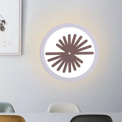 White leaf wall light by Decorbites; round wall lamp with brown leaf pattern on Tampa Home & Garden Store