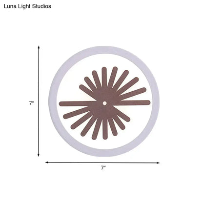 White Leaf Wall Light with brown sunburst leaf motif inside circular frame 7 inch diameter on Tampa Home & Garden Store