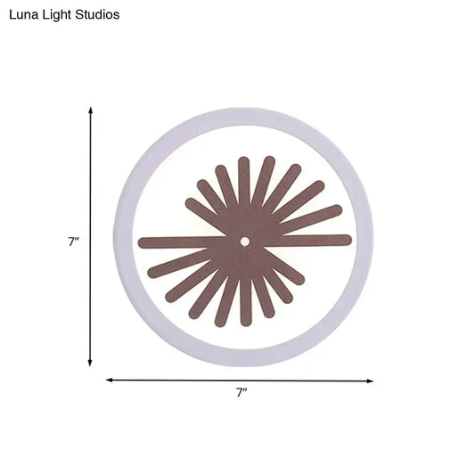White Leaf Wall Light with brown sunburst leaf motif inside circular frame 7 inch diameter on Tampa Home & Garden Store
