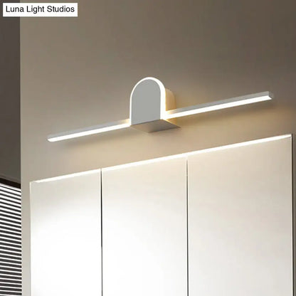 Decorbites white slim vanity sconce with curved backplate and long LED bar above cabinets on Tampa Home & Garden Store