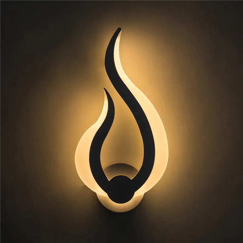 White Spiral LED Sconce by Decorbites, wall light with flame curves and warm glow on Tampa Home & Garden Store