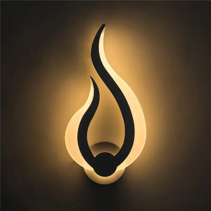 White Spiral LED Sconce by Decorbites, wall light with flame curves and warm glow on Tampa Home & Garden Store