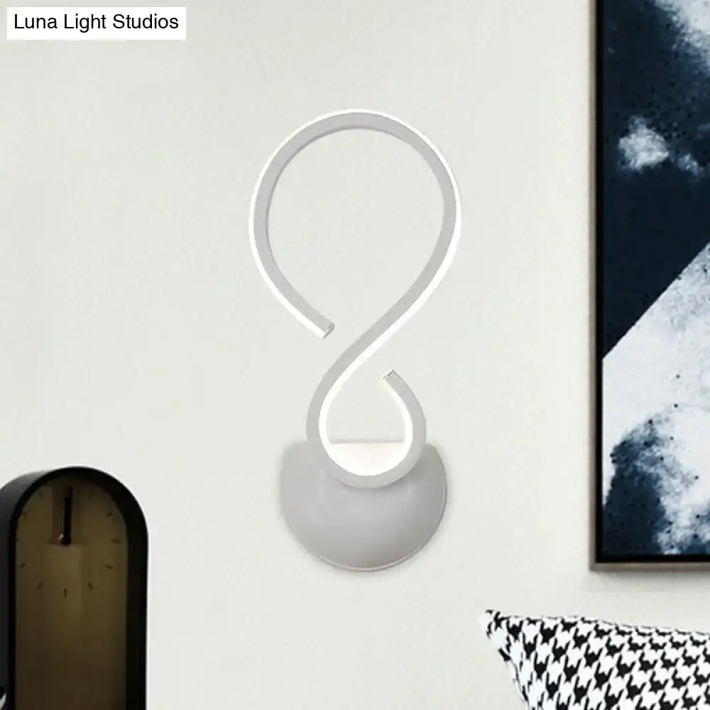 White twist wall lamp by Decorbites, modern curved metal wall sconce on Tampa Home & Garden Store