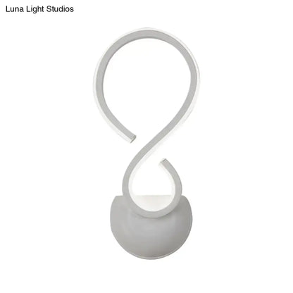 White twist wall lamp with looping S-shaped arm and round base Decorbites on Tampa Home & Garden Store
