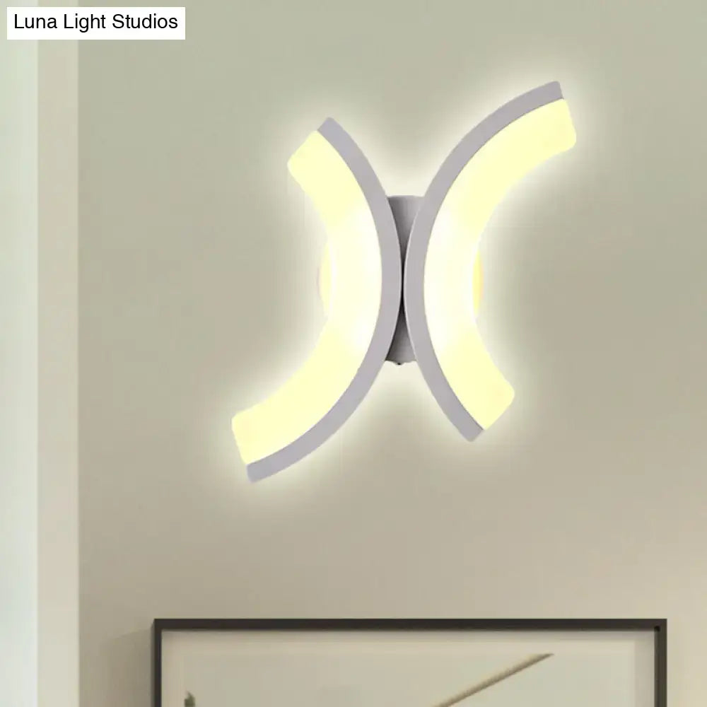 White U-Shaped wall sconce with dual curved LED panels emitting warm glow on Tampa Home & Garden Store