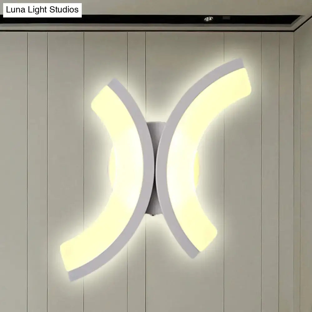 White U-shaped wall sconce with dual curved light panels on Tampa Home & Garden Store