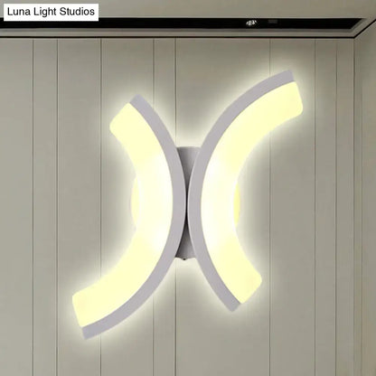 White U-shaped wall sconce with dual curved light panels on Tampa Home & Garden Store
