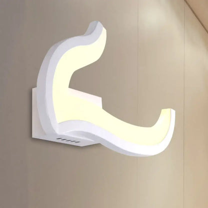 White U-Shaped Wall Sconce by Decorbites, sculptural LED light with soft ambient glow on wall on Tampa Home & Garden Store