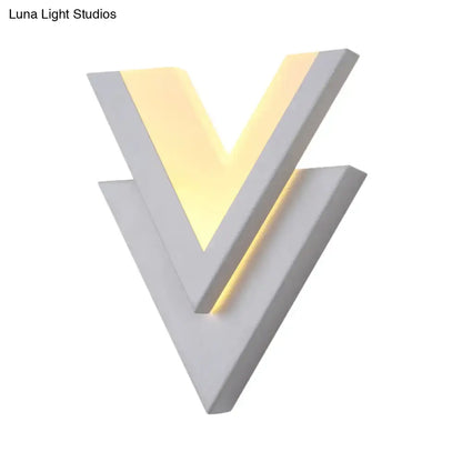 White V-Neck Wall Sconce, V-shaped geometric light with warm glow on Tampa Home & Garden Store