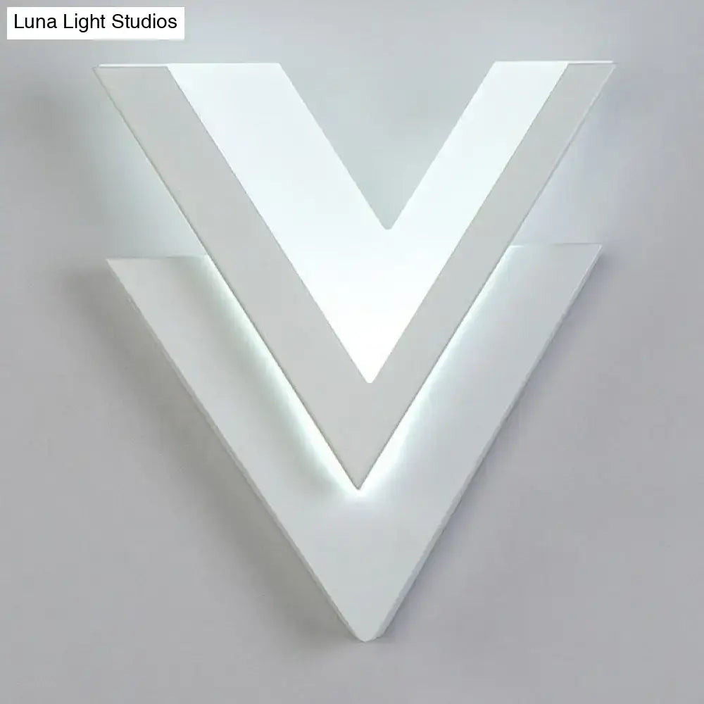 White V-shaped LED wall sconce with geometric modern design, wall-mounted lighting on Tampa Home & Garden Store