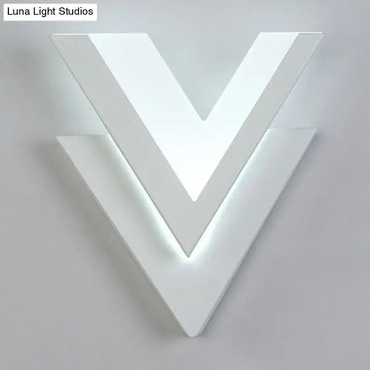 White V-shaped LED wall sconce with geometric modern design, wall-mounted lighting on Tampa Home & Garden Store