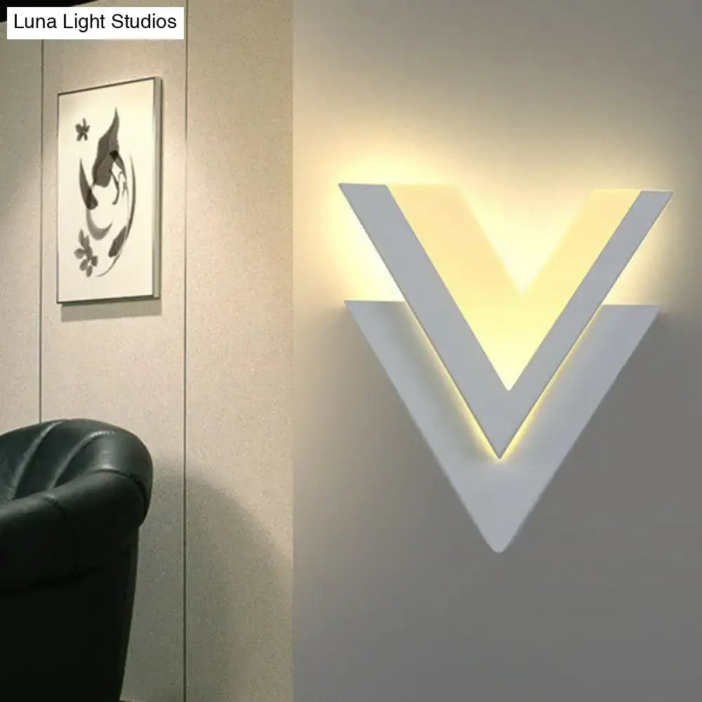White V-Shaped LED Wall Sconce by Decorbites with warm ambient glow on Tampa Home & Garden Store