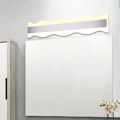 Modern white wave LED bathroom sconce by Decorbites with warm white glow on Tampa Home & Garden Store