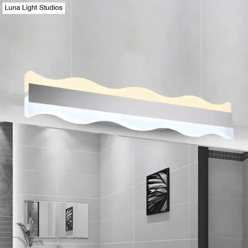 Modern white wave LED bathroom sconce with warm white glow Decorbites on Tampa Home & Garden Store