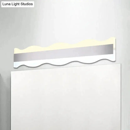 Modern white wave LED bathroom wall sconce by Decorbites warm white light on Tampa Home & Garden Store