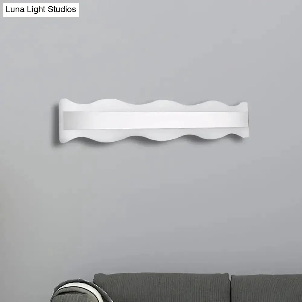 Modern white wave LED wall sconce, wall-mounted bathroom fixture on Tampa Home & Garden Store