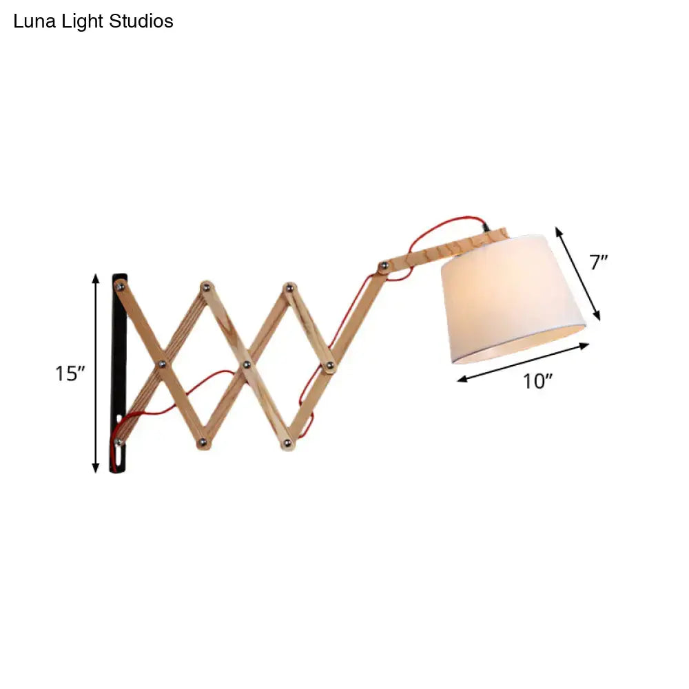 Wood accordion wall sconce in natural wood with fabric shade on extendable arms on Tampa Home & Garden Store
