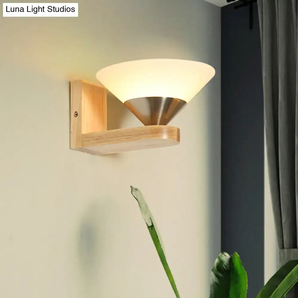 Glass brass wall lamp with frosted shade on wooden wall mount by Decorbites on Tampa Home & Garden Store