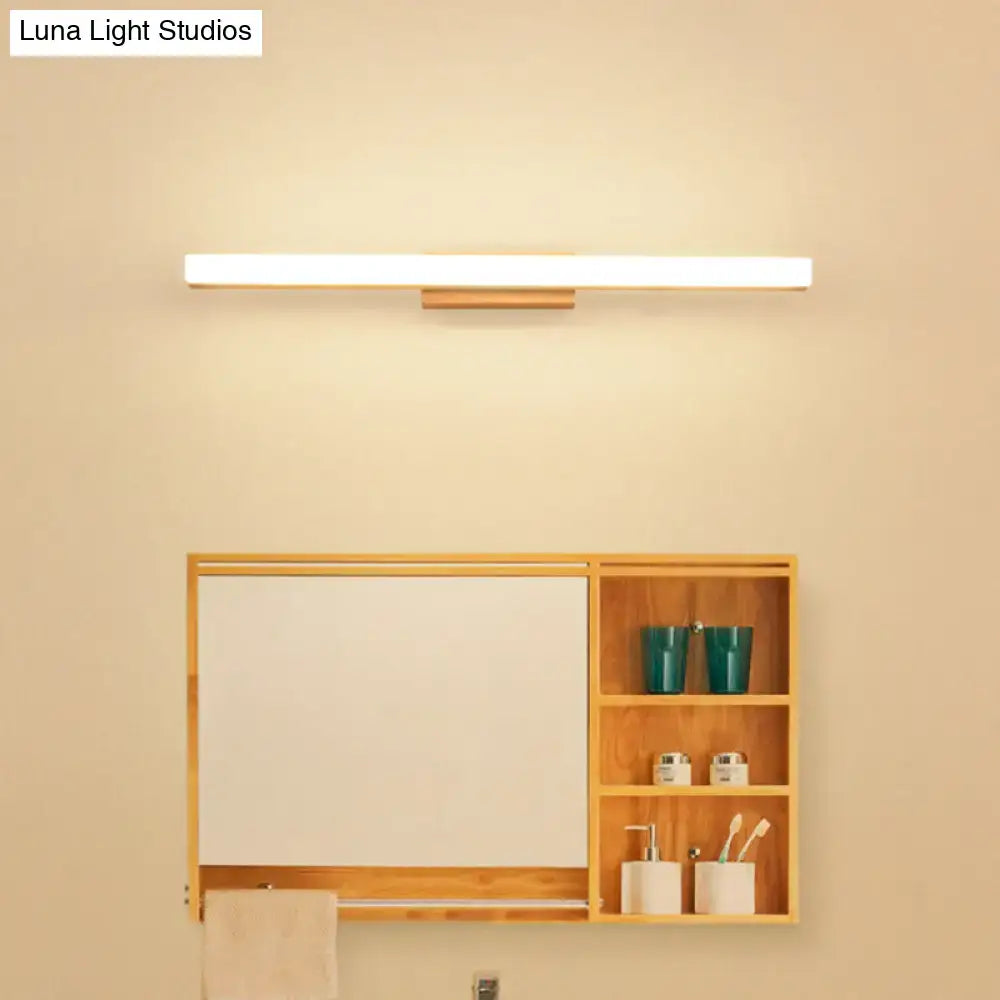 Beige Wood Vanity Light by Decorbites above a wooden bathroom vanity with open shelves on Tampa Home & Garden Store