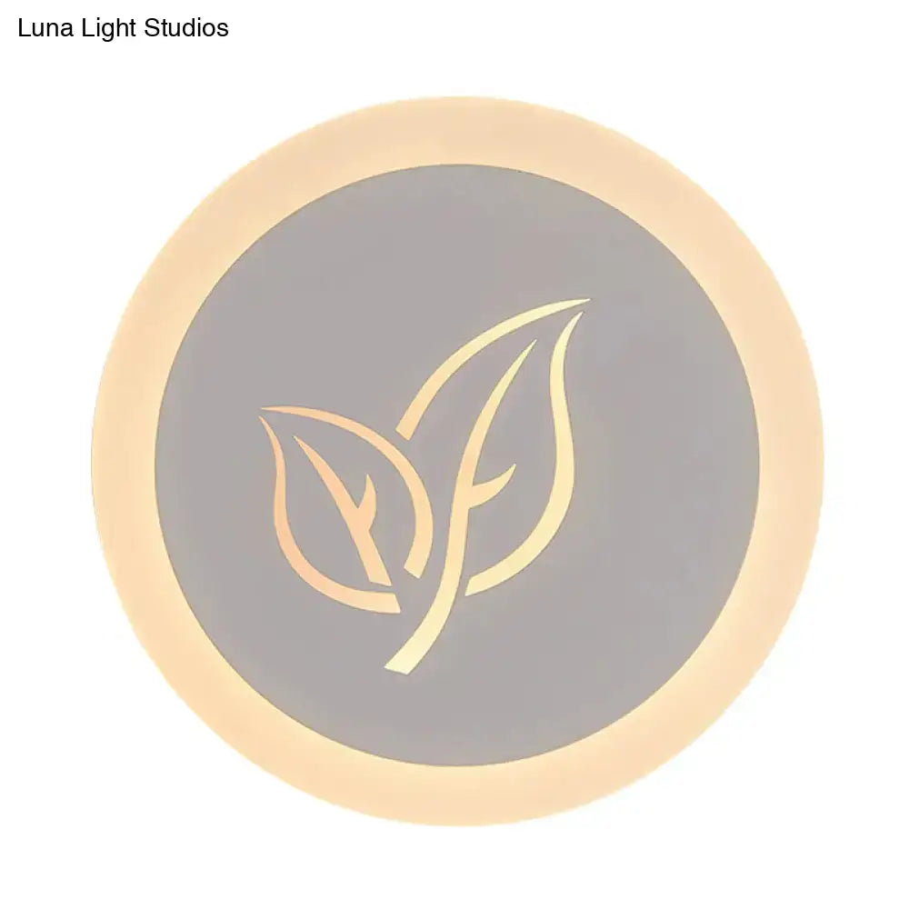 White acrylic leaf wall lamp by Decorbites, circular backlit sconce with grey center leaf design on Tampa Home & Garden Store