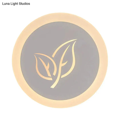 White acrylic leaf wall lamp by Decorbites, circular backlit sconce with grey center leaf design on Tampa Home & Garden Store