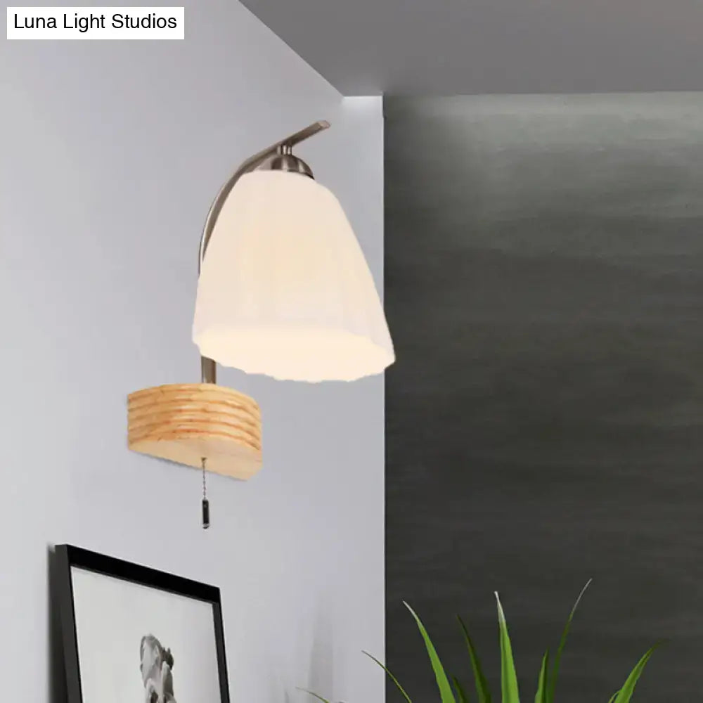 Ribbed Glass Wall Sconce by Decorbites with curved metal arm and shade, two items visible on Tampa Home & Garden Store