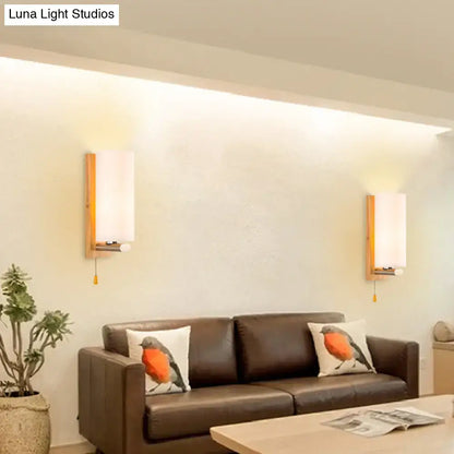 White Glass Wall Sconce - Cylindrical Bedside Light with Pull Chain