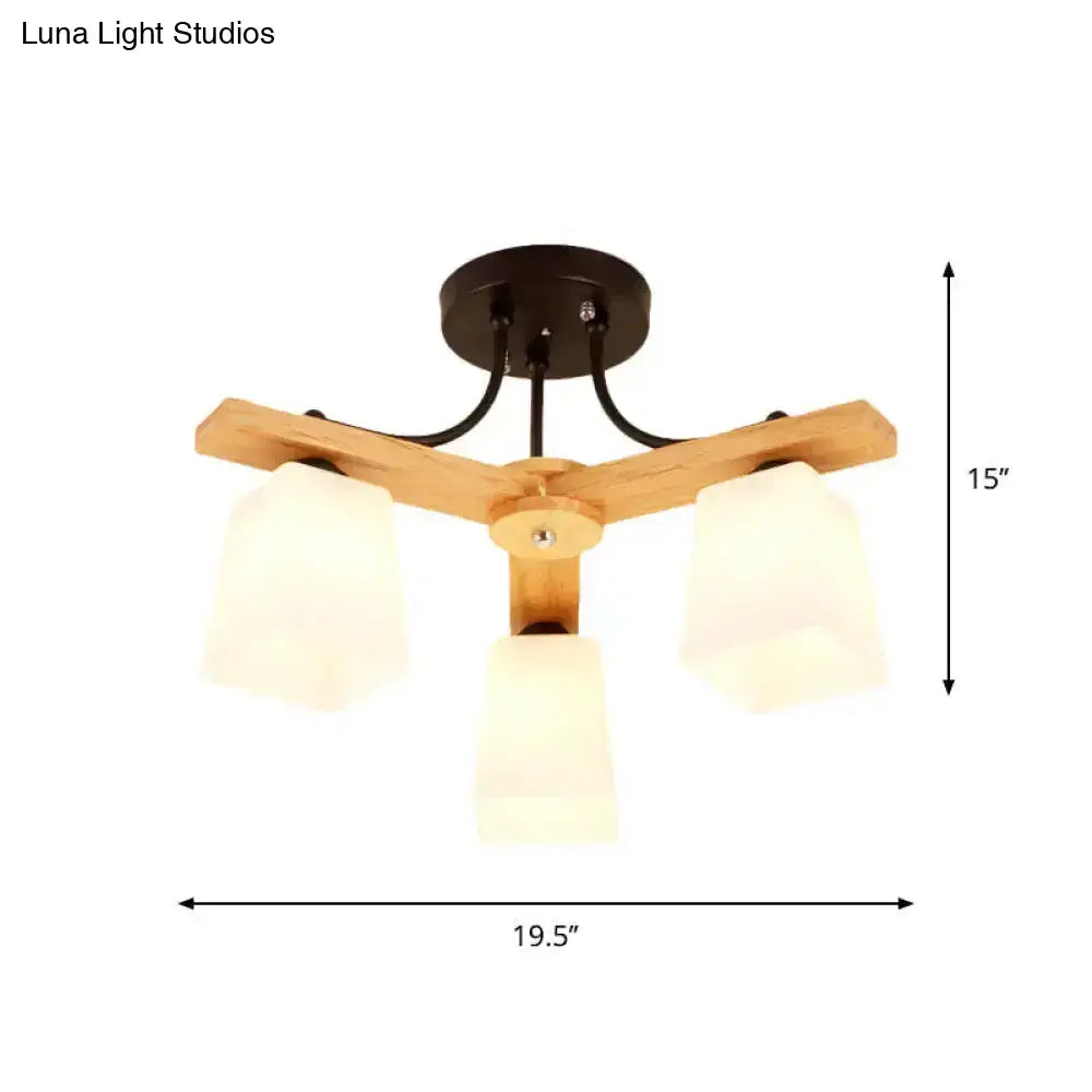 Black milk-glass ceiling light by Decorbites with wooden arms and three frosted shades on Tampa Home & Garden Store