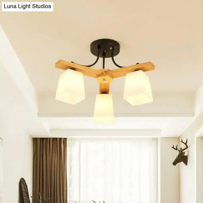 Black milk glass light fixture with natural wood arms and three frosted shades Decorbites on Tampa Home & Garden Store