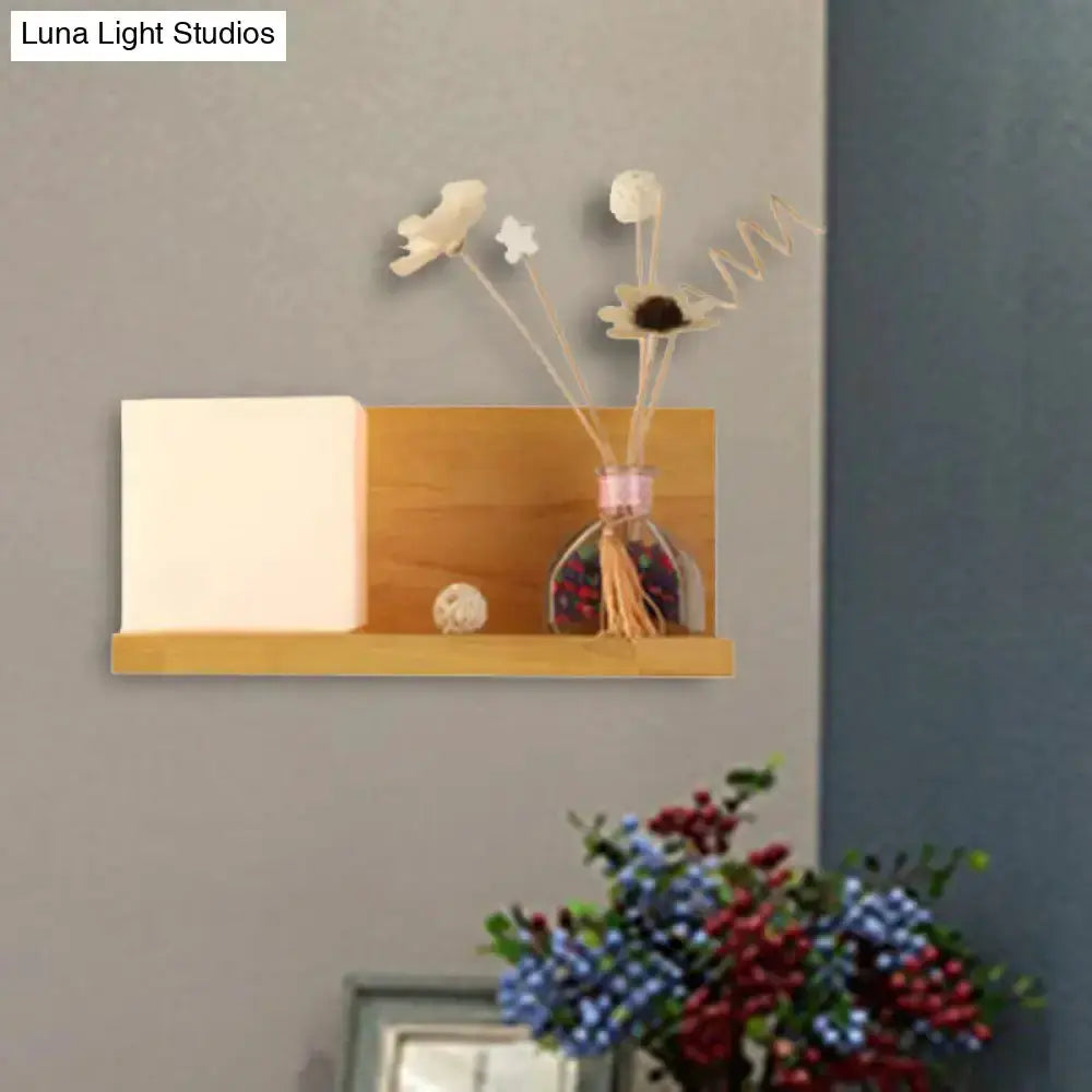 Decorbites modern wood floating shelf with beige bedroom sconce light on gray wall on Tampa Home & Garden Store