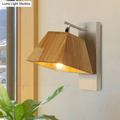 Beige wood trapezoid wall sconce by Decorbites; warm glow, metal backplate on Tampa Home & Garden Store