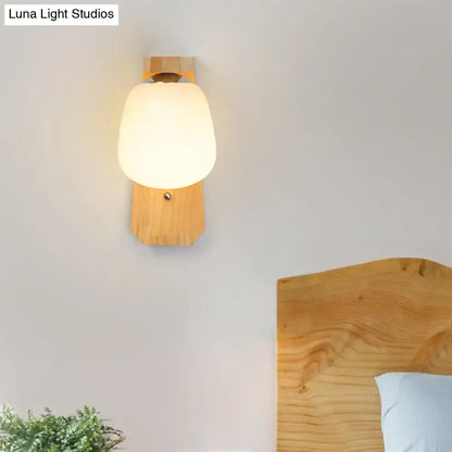 Wooden Globe Wall Lamp by Decorbites with frosted glass globe and natural wood backplate on Tampa Home & Garden Store