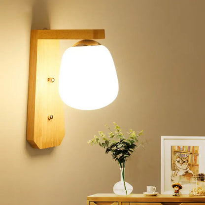 Wooden Globe Wall Lamp by Decorbites with a white shade on natural wood backplate on Tampa Home & Garden Store